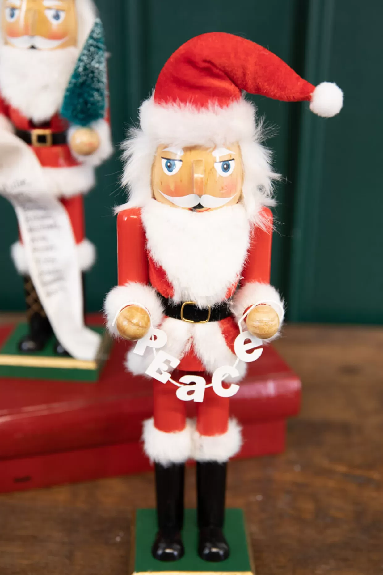 Decorator's Warehouse 15" Santa Nutcracker With Peace Garland
