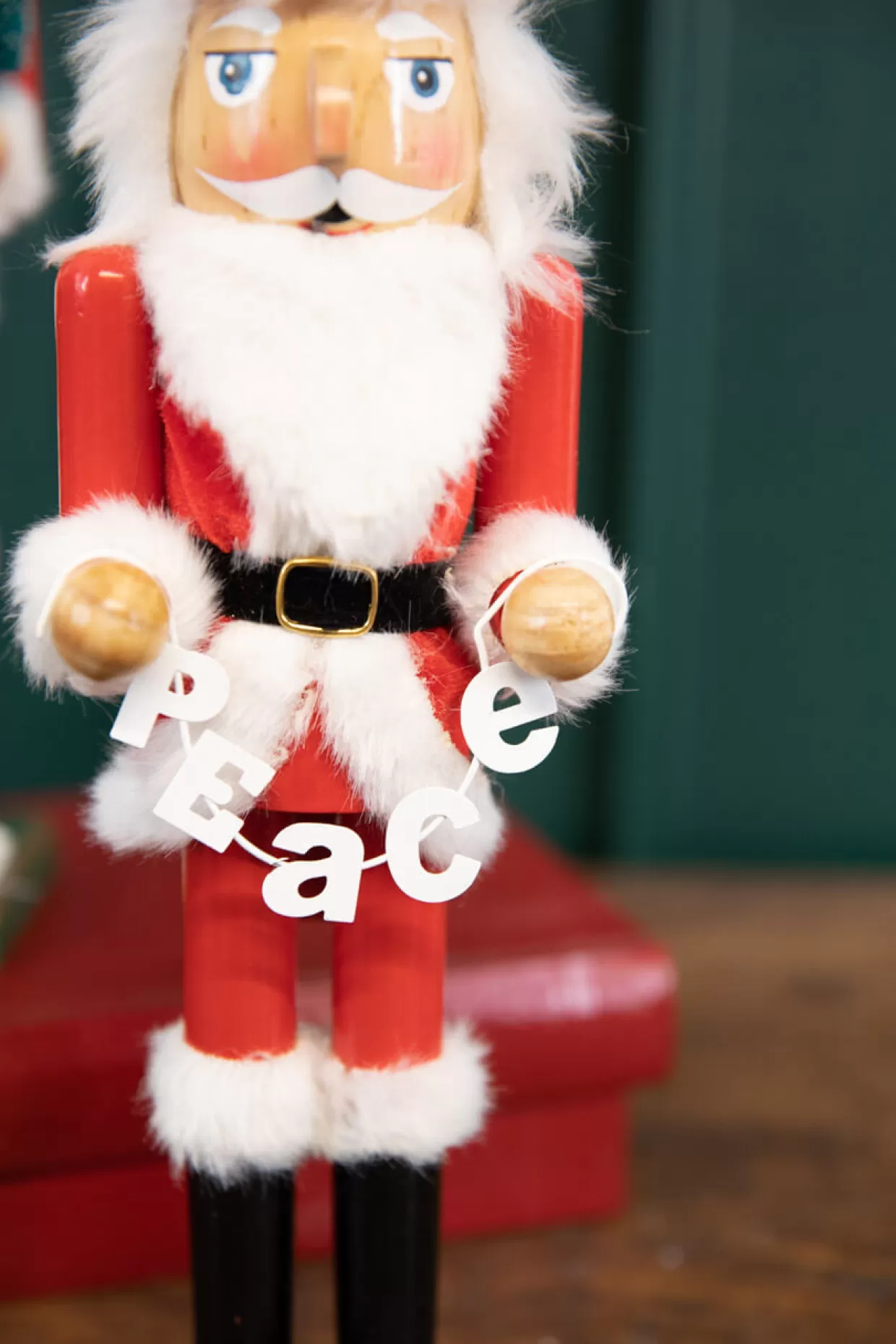 Decorator's Warehouse 15" Santa Nutcracker With Peace Garland